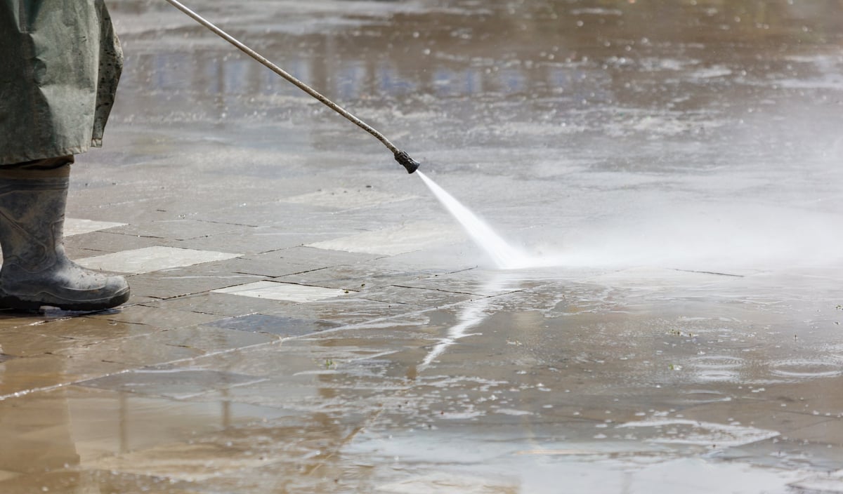 Professional cleaner with pressure washer equipment